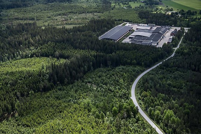 Bilden visar ett flygfoto över planlagd mark vid Trävaruvägen.